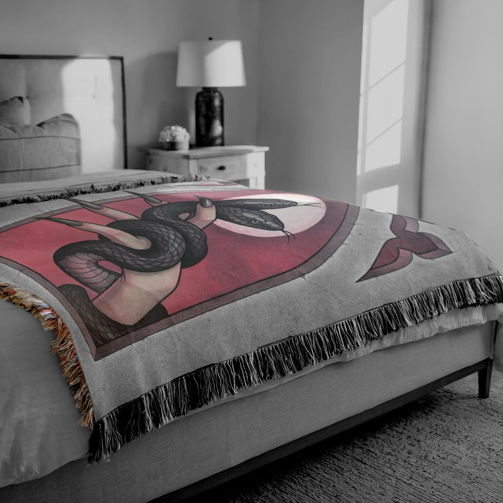 Snake charmer Woven Blanket
